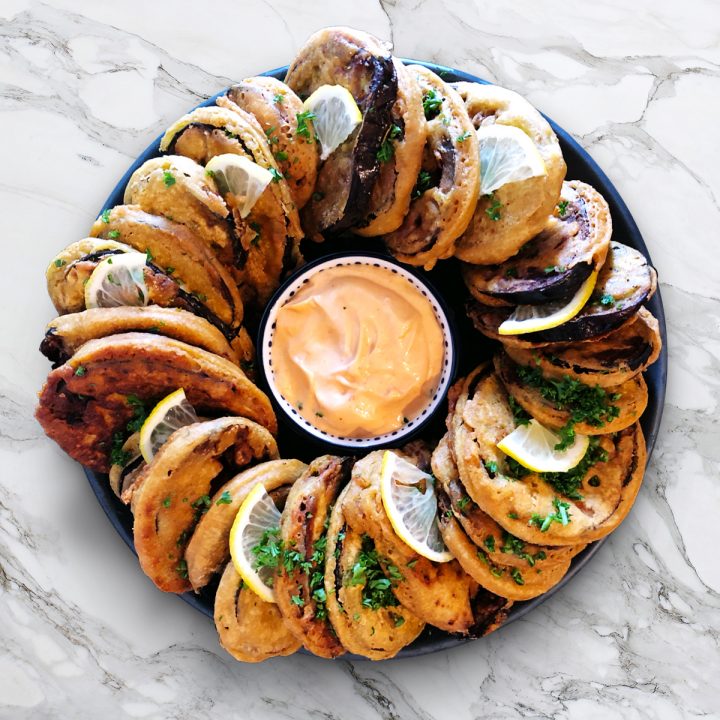 eggplant fritters arranged in a circular manner